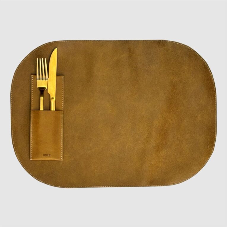 leather placemat sand